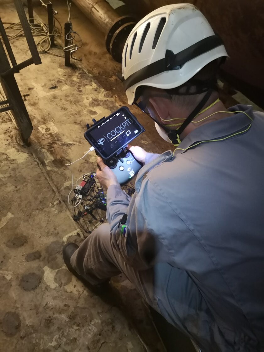 Image of drone operator using equipment